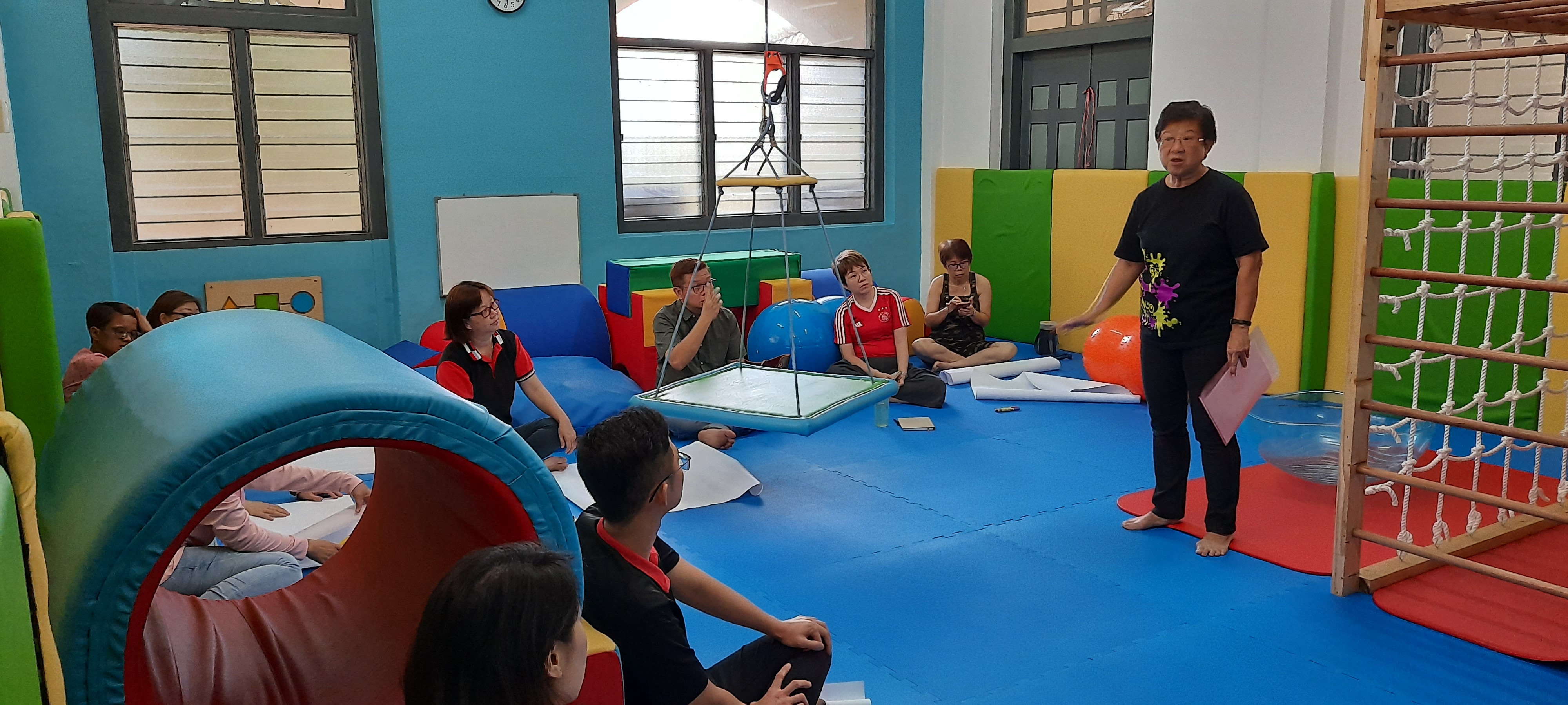Ms Teo Lee Fun sharing with Wings staff and volunteers